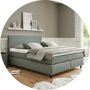 Home 15 Een rustgevende slaapkamer met uitnodigend bed, zachte texturen en natuurlijke kleuren voor een heerlijke nachtrust.
